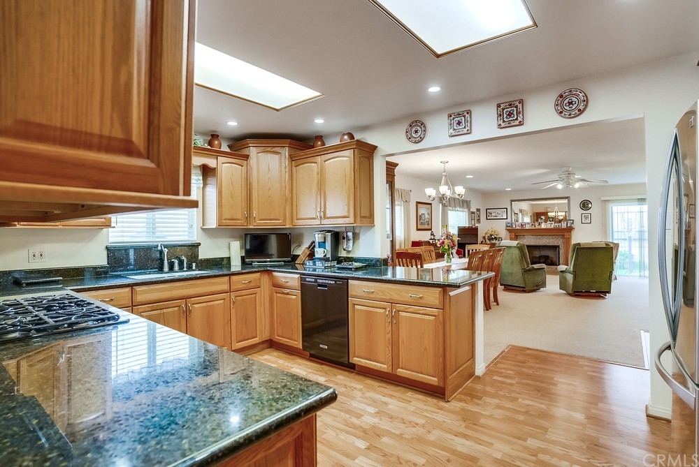 2418 Ives Lane Redondo Beach, CA 90278 - Photo 4 of 31 Kitchen opens to dining area, family room w fireplace and yard