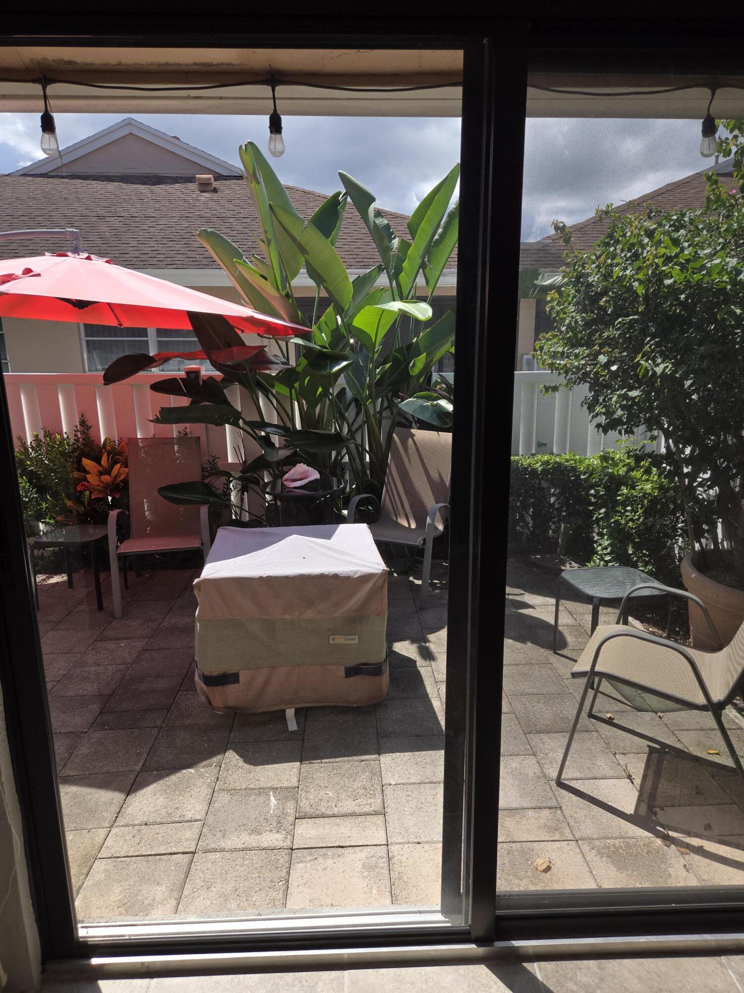 8081 Springtree Road, Unit C Boca Raton, FL 33496 - Photo 12 of 31 a view of outdoor seating