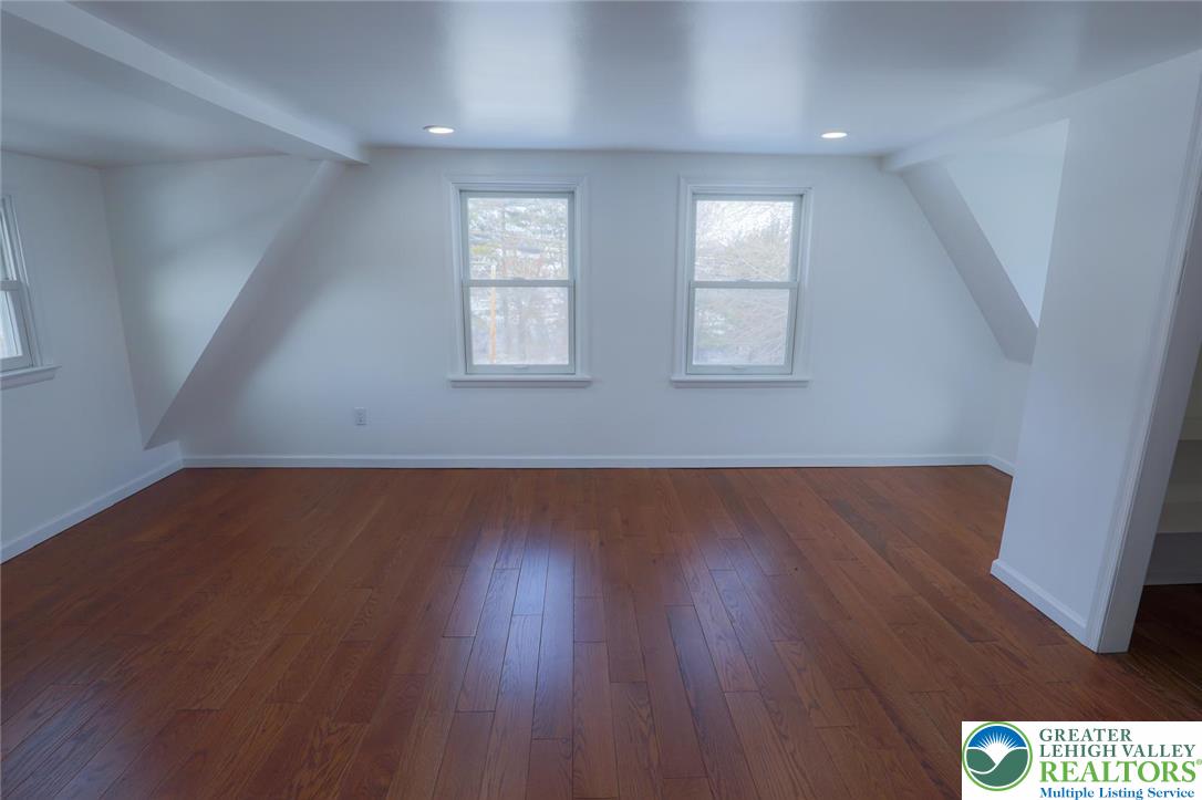 2270 Easton Road Bethlehem, PA 18015 - Photo 26 of 43 an empty room with wooden floor and windows