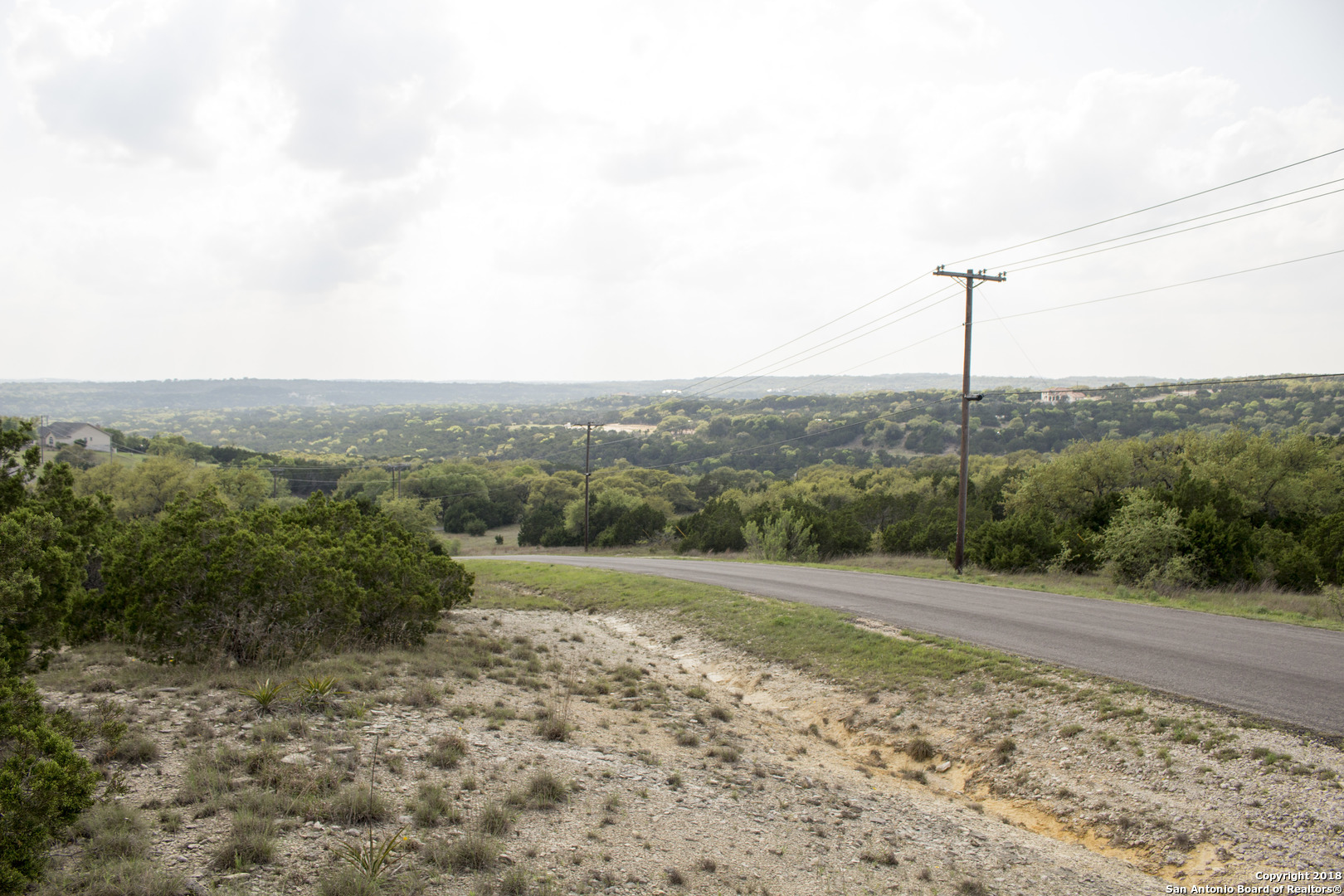 110 Peppergrass Drive Spring Branch, TX 78070 - Photo 2 of 9 a view of a road with a yard