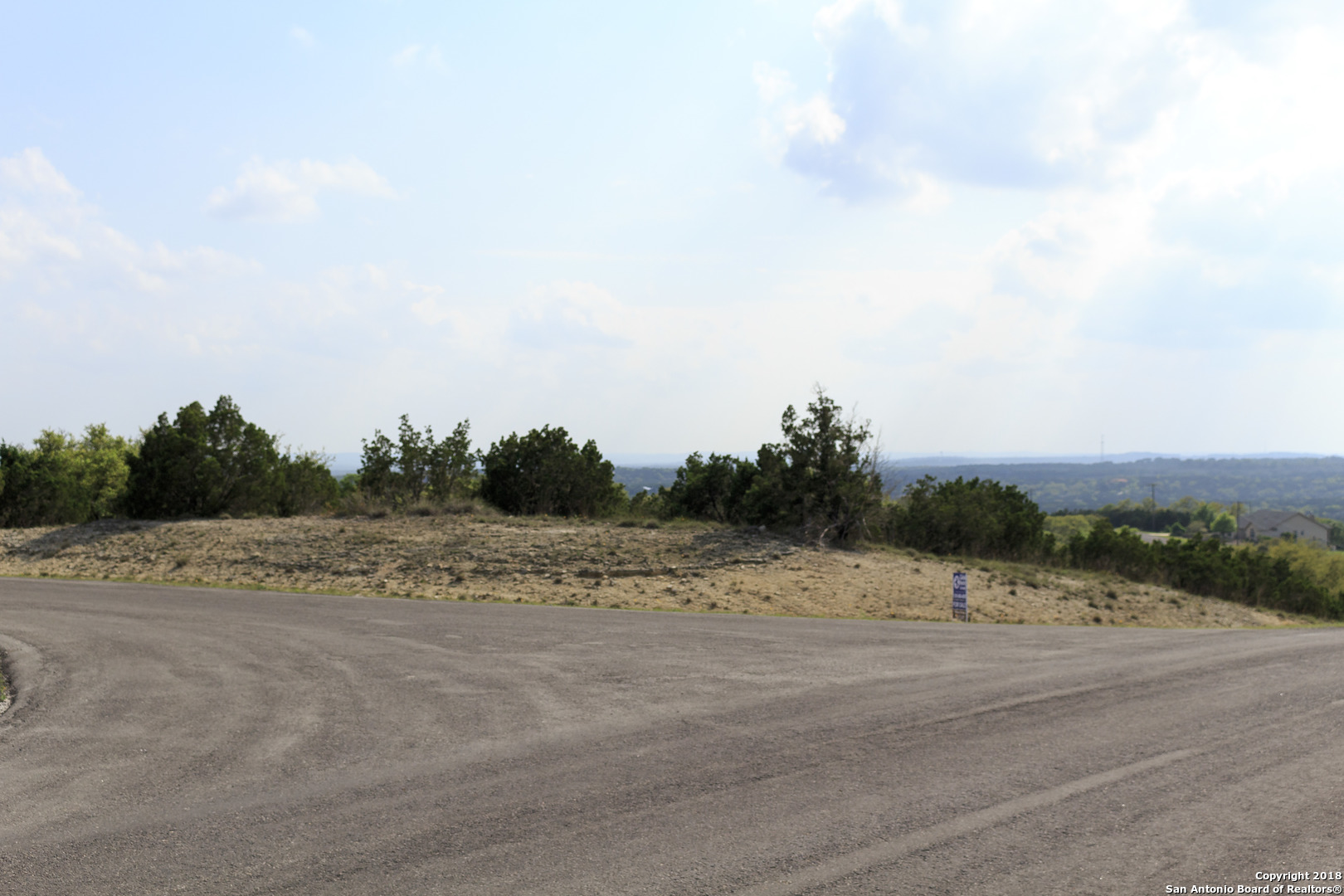 110 Peppergrass Drive Spring Branch, TX 78070 - Photo 6 of 9 a view of a road and a houses