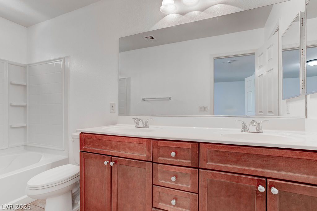 4650 Ranch House Road, Unit 47 North Las Vegas, NV 89031 - Photo 28 of 43 Double vanity and a full-size bathtub offer comfortable everyday living.