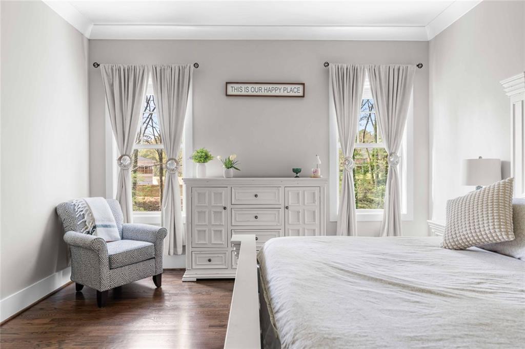 5758 Williams Road Norcross, GA 30093 - Photo 23 of 90 a bedroom with a bed and a couch