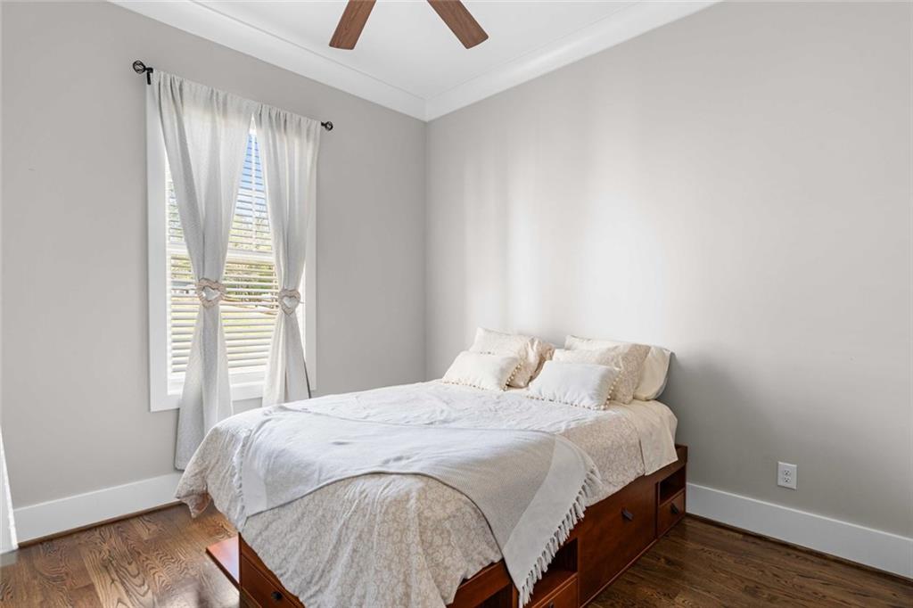 5758 Williams Road Norcross, GA 30093 - Photo 33 of 90 a bedroom with a bed and a window