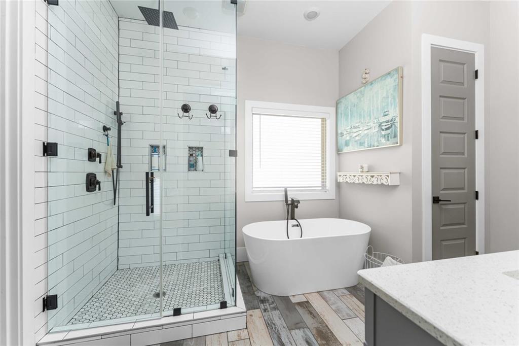 5758 Williams Road Norcross, GA 30093 - Photo 5 of 90 a bathroom with a sink and a shower