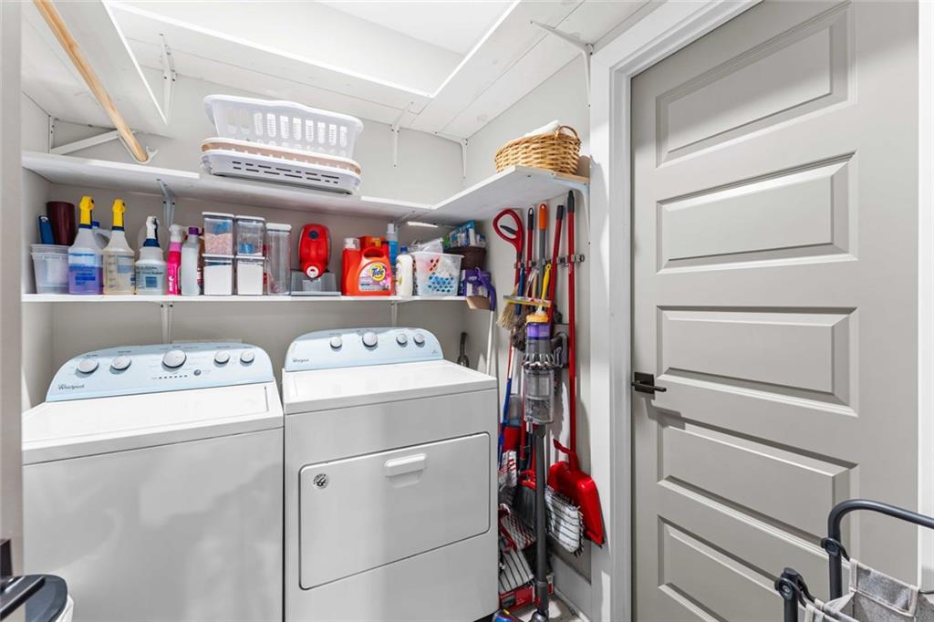 5758 Williams Road Norcross, GA 30093 - Photo 53 of 90 a utility room with dryer and washer