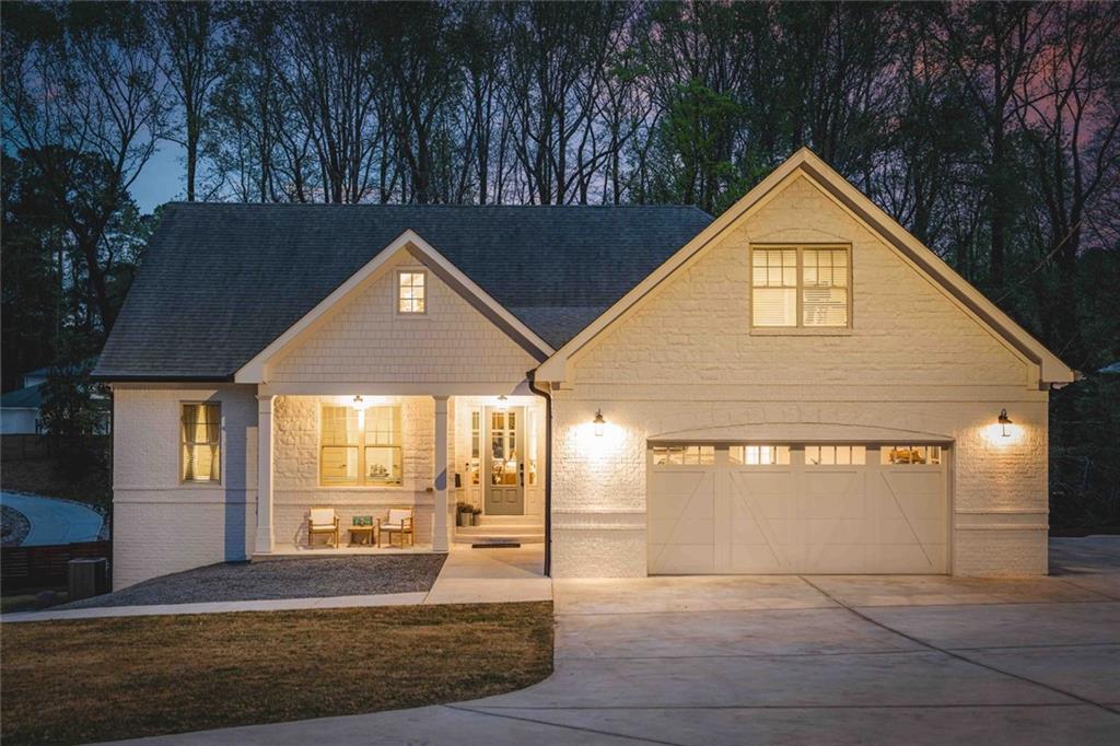 5758 Williams Road Norcross, GA 30093 - Photo 7 of 90 a front view of house along with trees