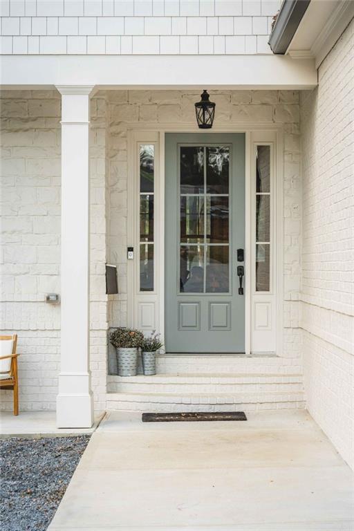 5758 Williams Road Norcross, GA 30093 - Photo 82 of 90 a view of a brick house with outdoor space