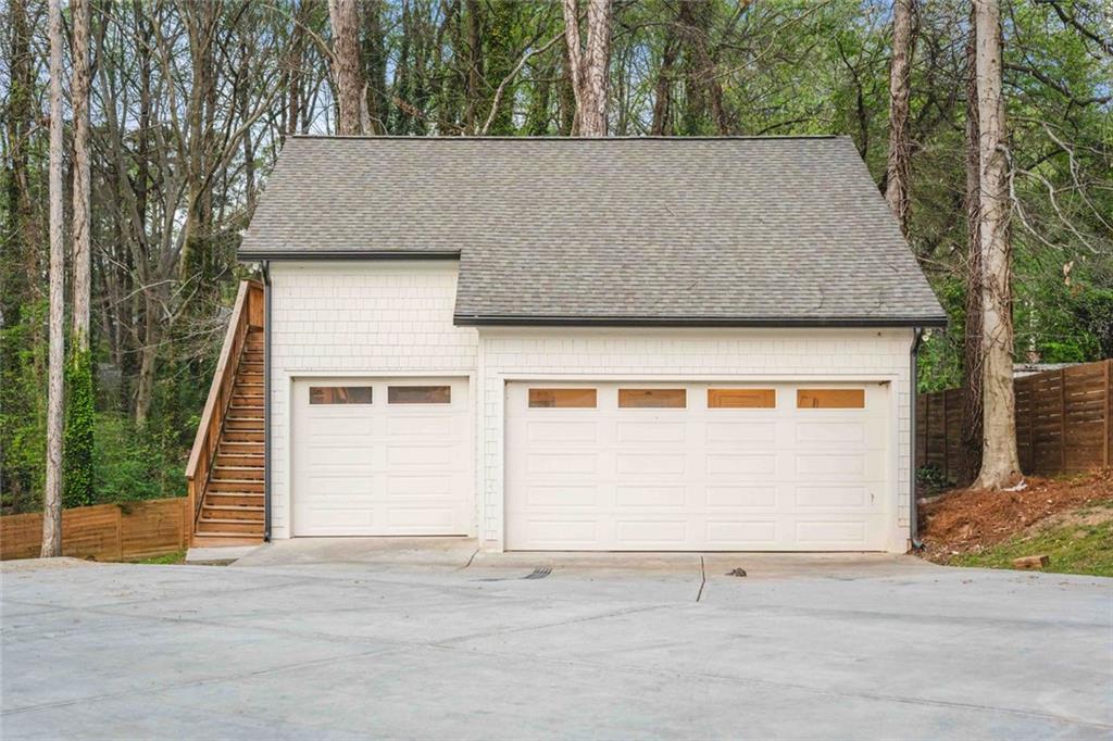 5758 Williams Road Norcross, GA 30093 - Photo 86 of 90 front view of a house with a garage