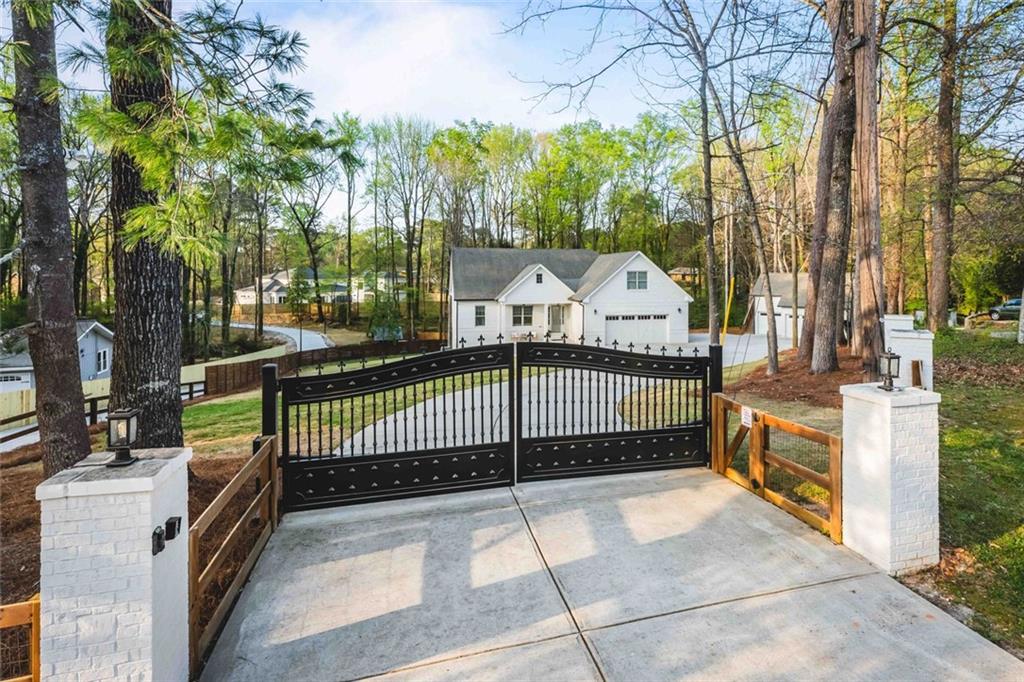 5758 Williams Road Norcross, GA 30093 - Photo 90 of 90 a view of a wrought iron fences in front of house