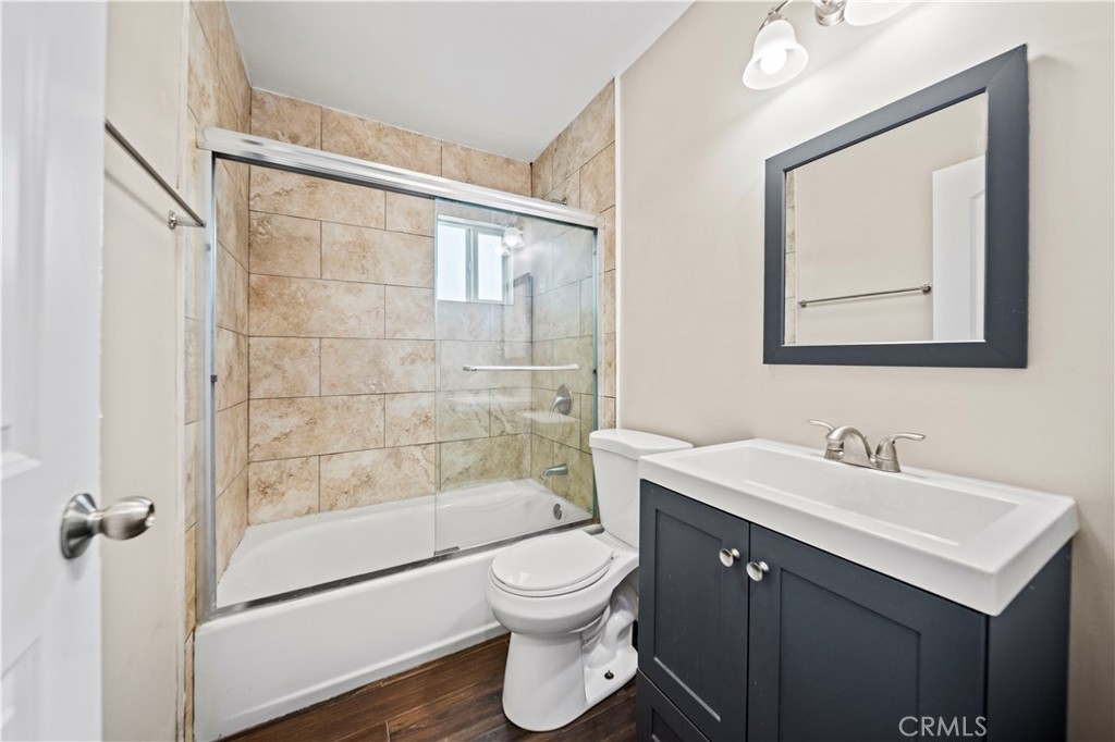 14559 Ector Street La Puente, CA 91744 - Photo 15 of 29 a bathroom with a toilet a sink and a bathtub