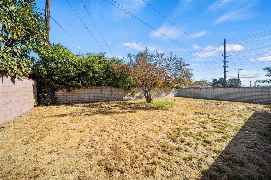 14559 Ector Street La Puente, CA 91744 - Photo 23 of 29 a view of a yard with wooden fence