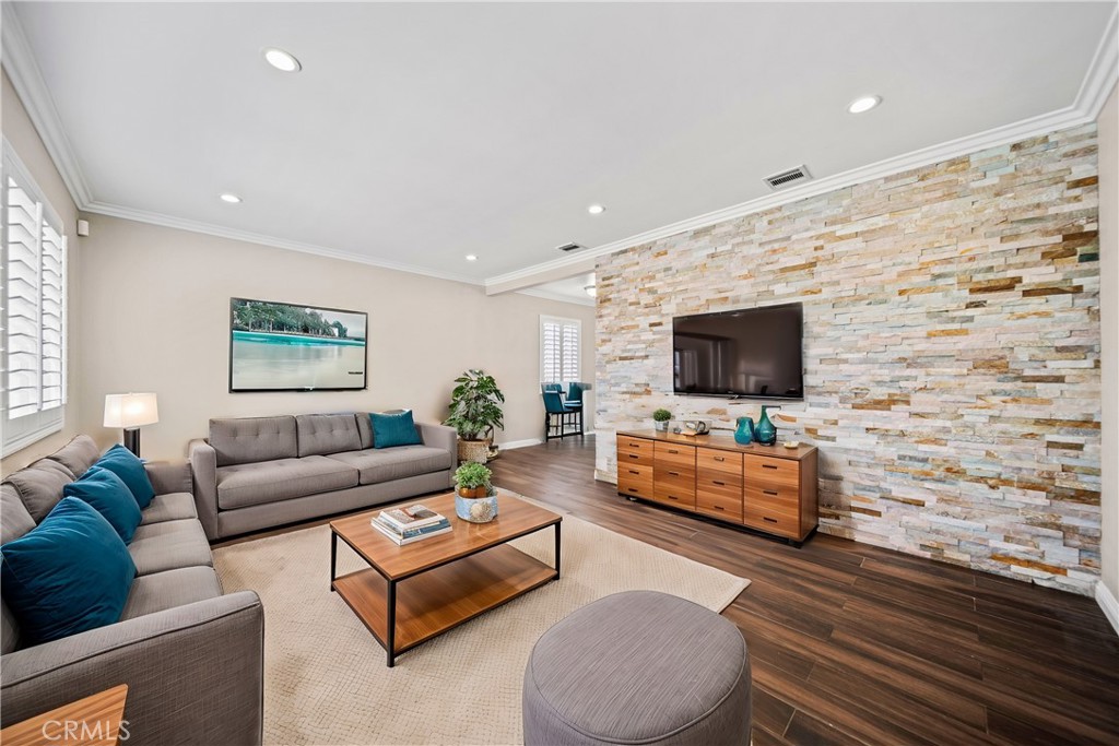 14559 Ector Street La Puente, CA 91744 - Photo 4 of 29 a living room with furniture and a flat screen tv