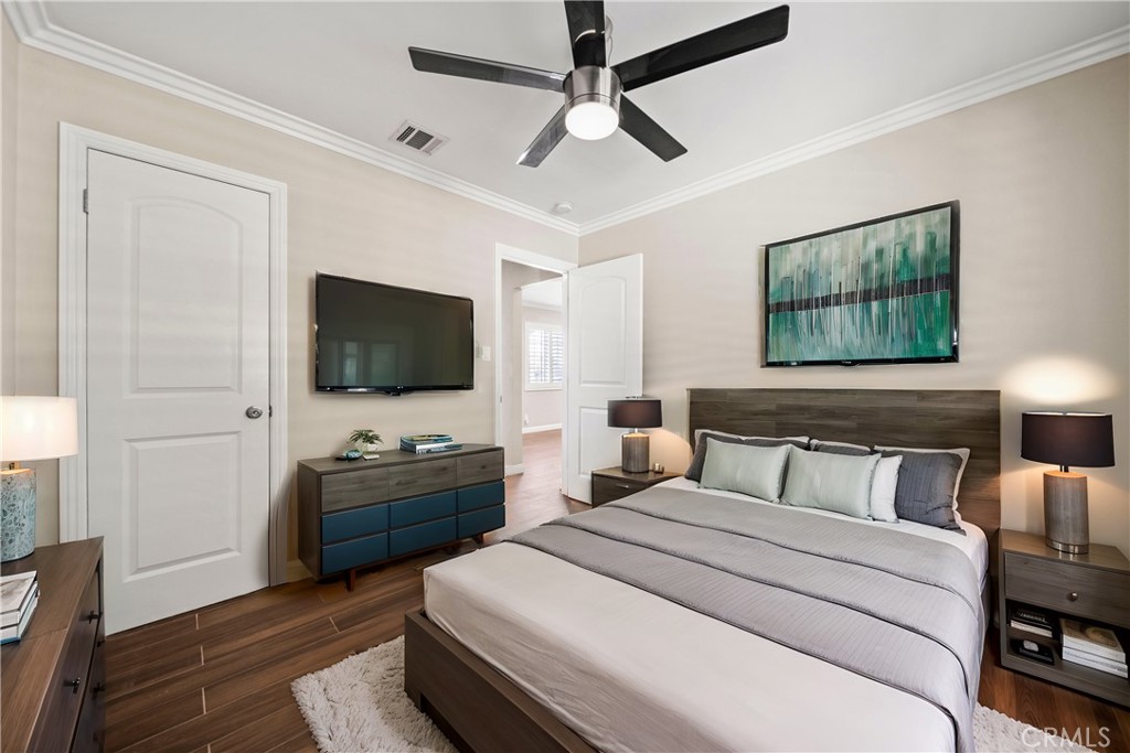 14559 Ector Street La Puente, CA 91744 - Photo 10 of 29 a bedroom with a bed and a flat screen tv