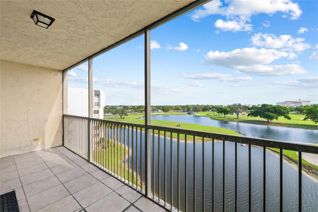 3150 West Rolling Hills Circle, Unit 603 Davie, FL 33328 - Photo 16 of 23 a view of balcony with yard