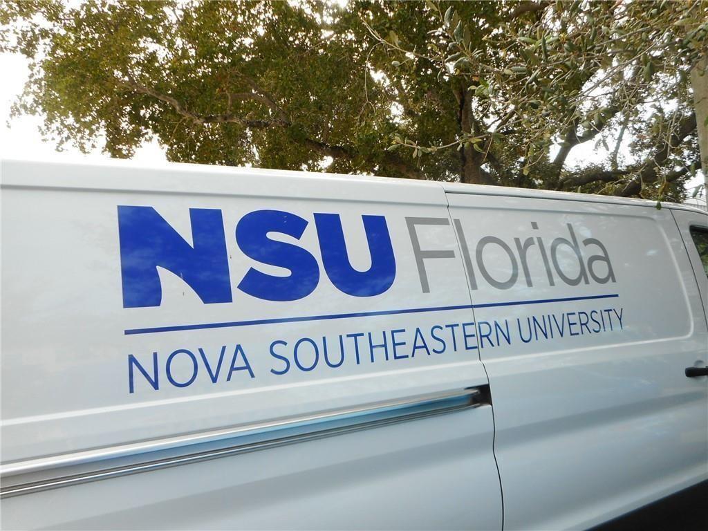 3150 West Rolling Hills Circle, Unit 603 Davie, FL 33328 - Photo 20 of 23 a close up of a street sign