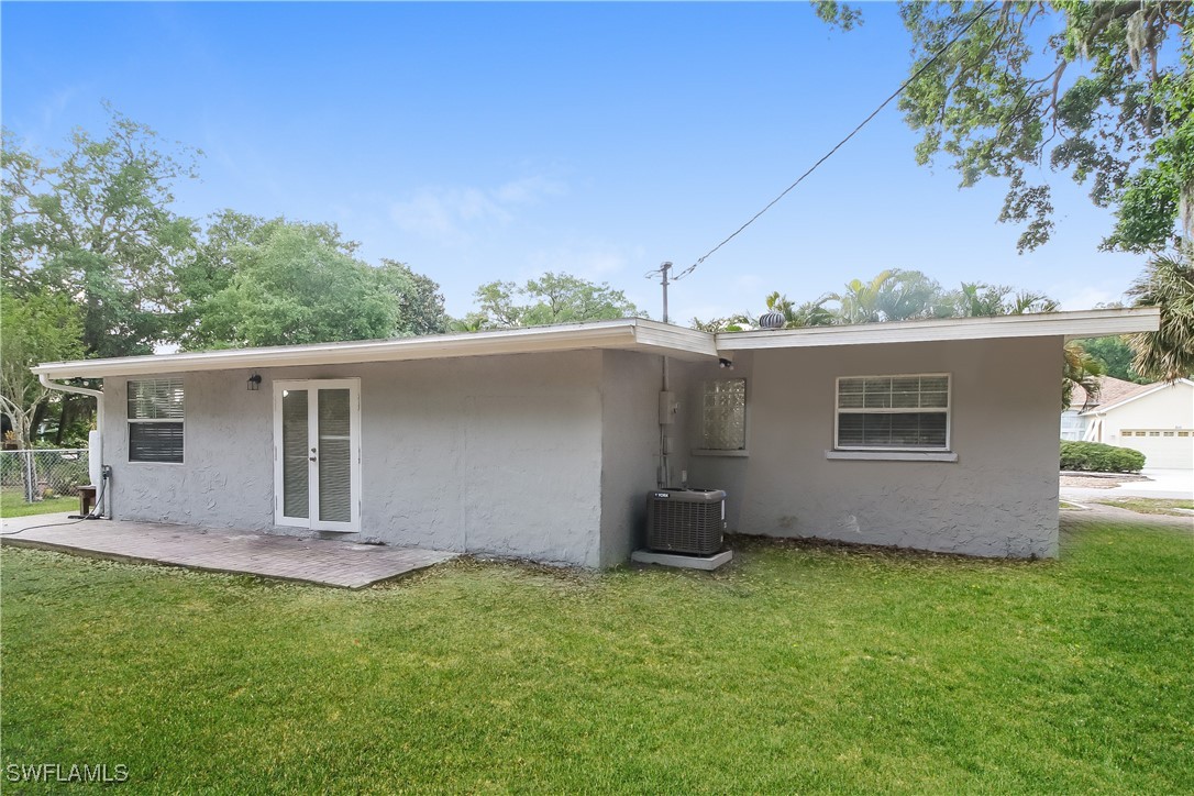 315 Ginger Road Venice, FL 34293 - Photo 16 of 16 a backyard of a house with table and chairs