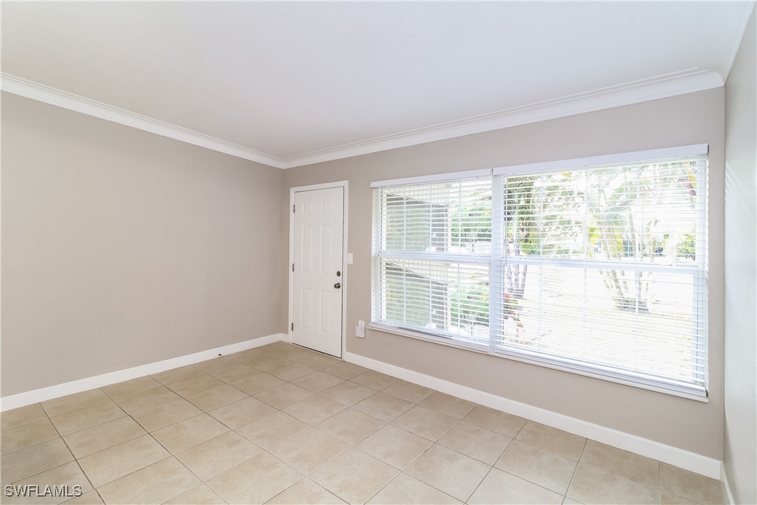 315 Ginger Road Venice, FL 34293 - Photo 4 of 16 a view of an empty room with a window
