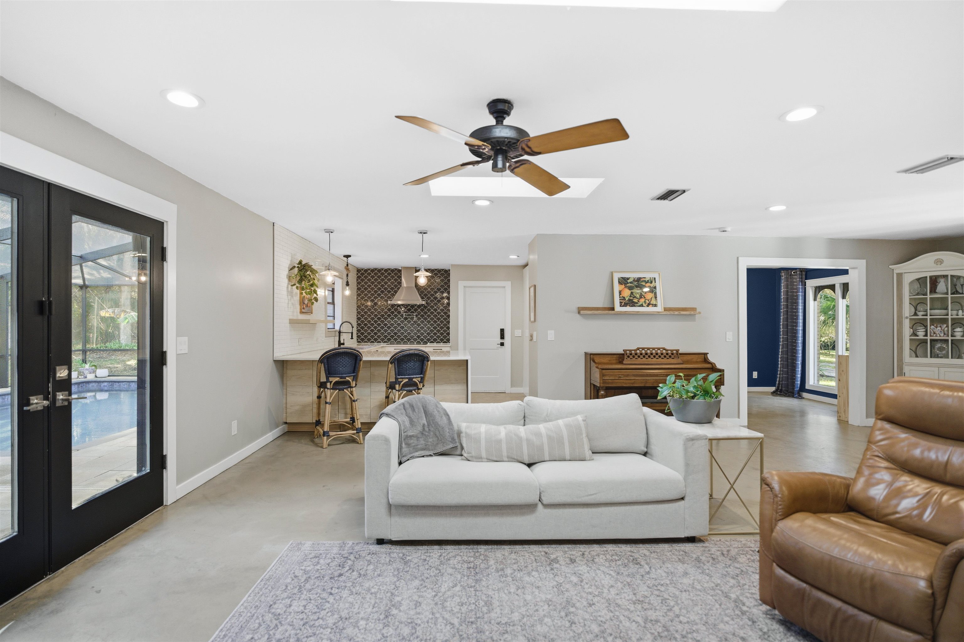 3572 Red Cloud Trail St. Augustine, FL 32086 - Photo 14 of 74 a living room with furniture and a ceiling fan