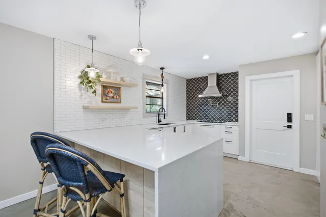 a room with furniture and a chair