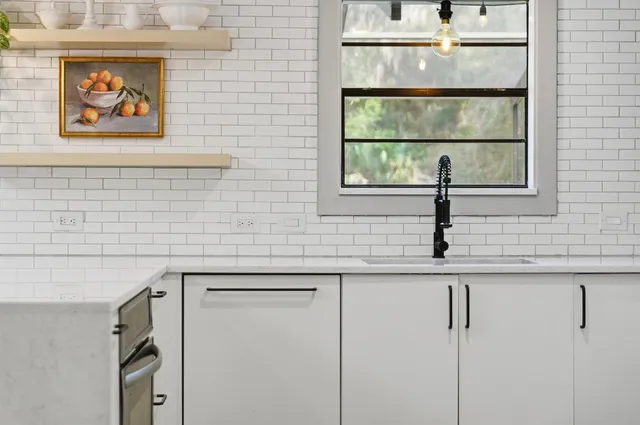 a dining room with furniture mountain view and a mirror