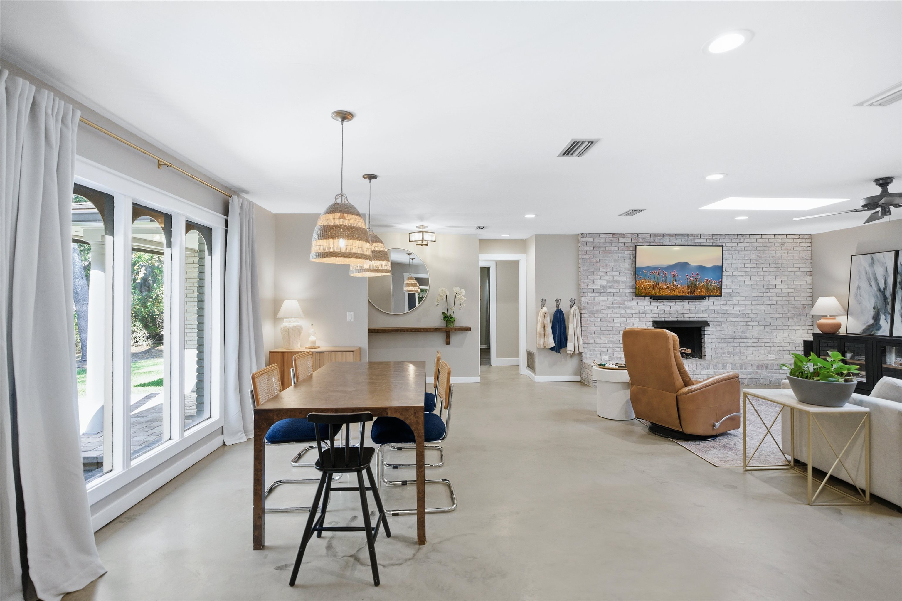 3572 Red Cloud Trail St. Augustine, FL 32086 - Photo 26 of 74 a dining room with furniture mountain view and a mirror