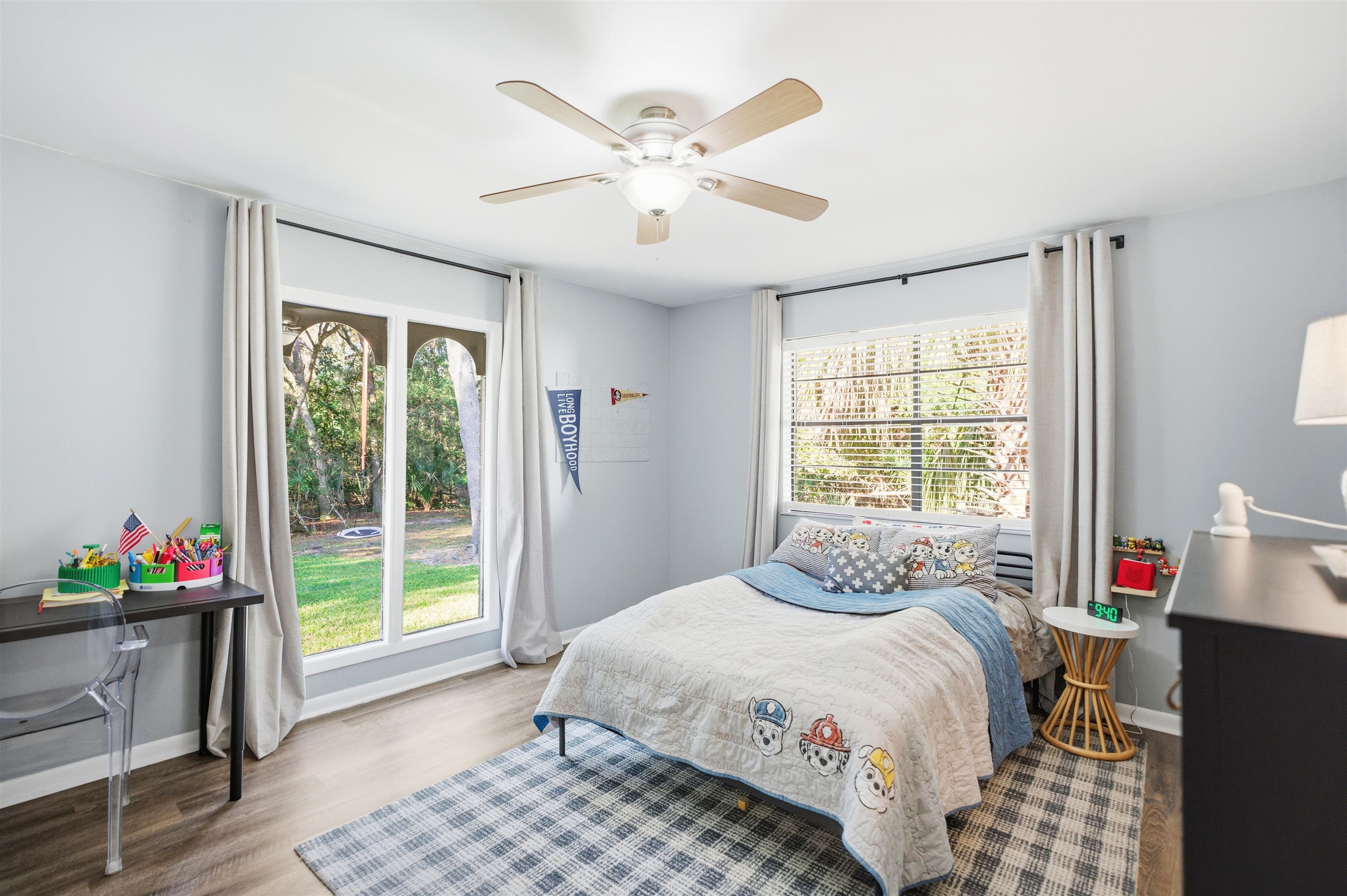 3572 Red Cloud Trail St. Augustine, FL 32086 - Photo 29 of 74 a bedroom with a bed and a large window