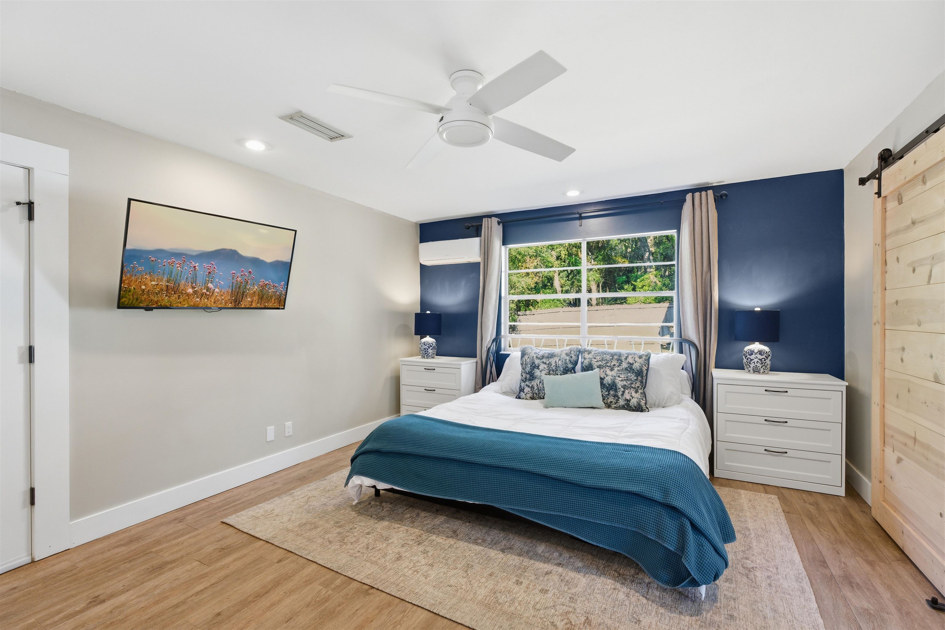 3572 Red Cloud Trail St. Augustine, FL 32086 - Photo 36 of 74 a bedroom with a large bed and a window