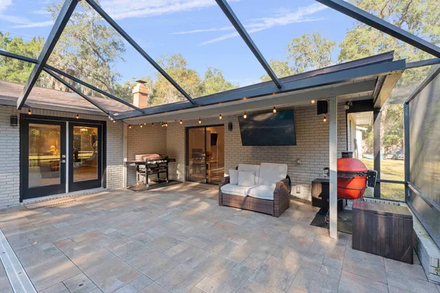 a view of a field and mountains in the background