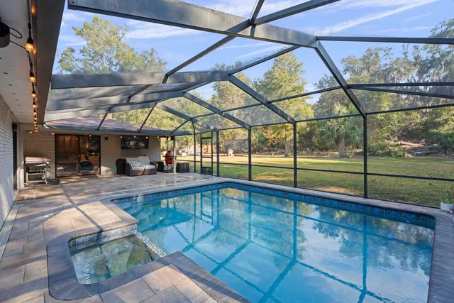 a street sign on a sidewalk next to a road