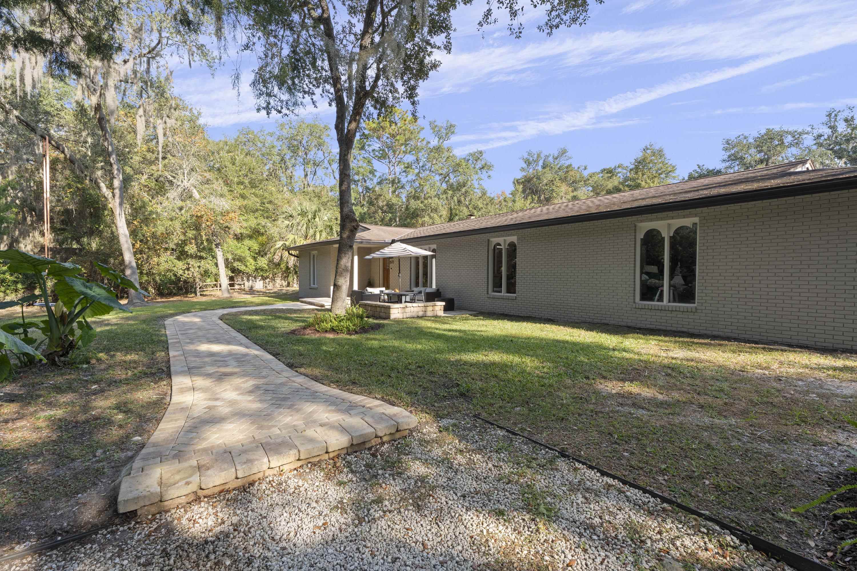 3572 Red Cloud Trail St. Augustine, FL 32086 - Photo 61 of 74 a view of a house with backyard and trees