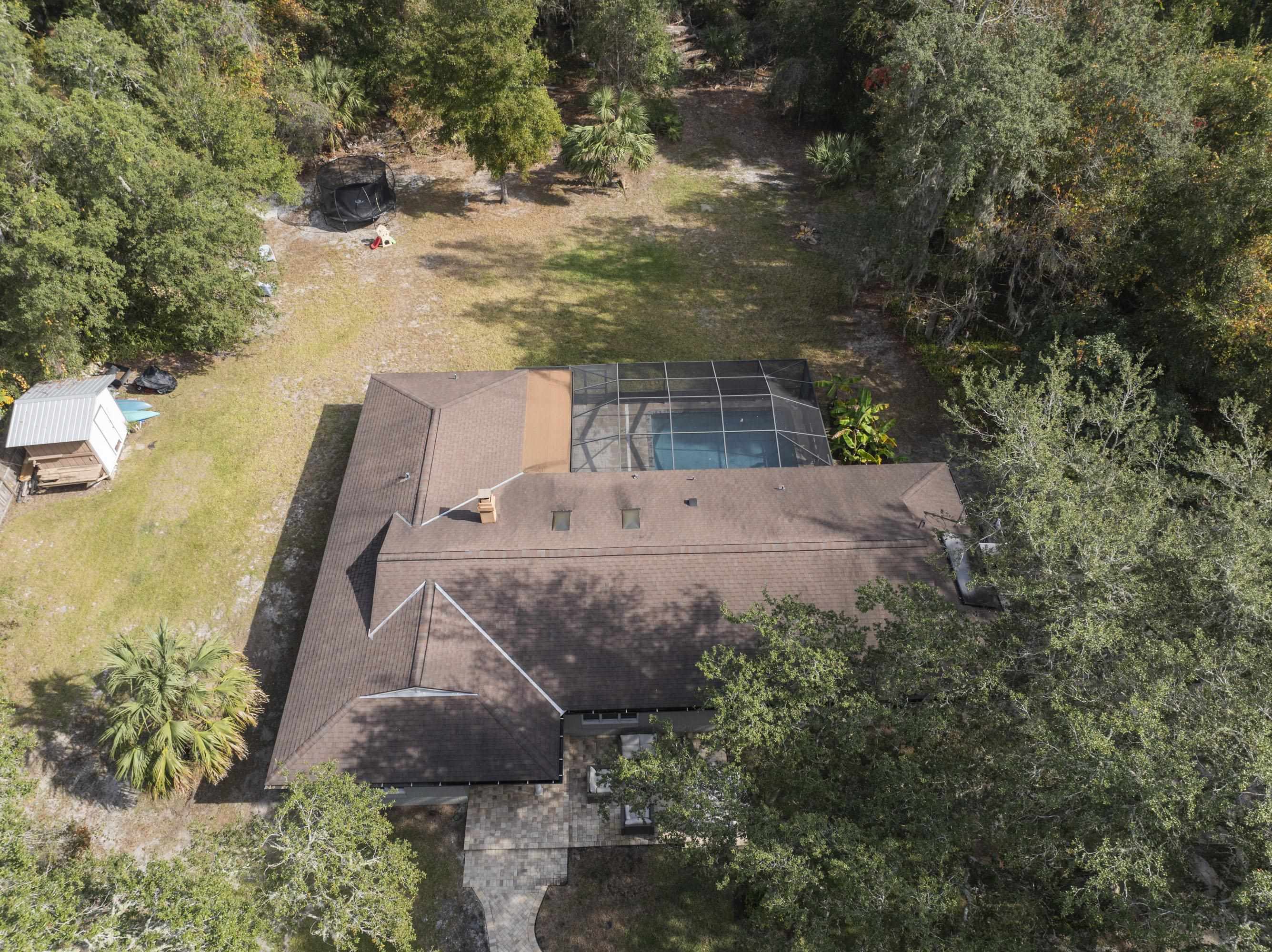 3572 Red Cloud Trail St. Augustine, FL 32086 - Photo 63 of 74 an aerial view of a house with a yard