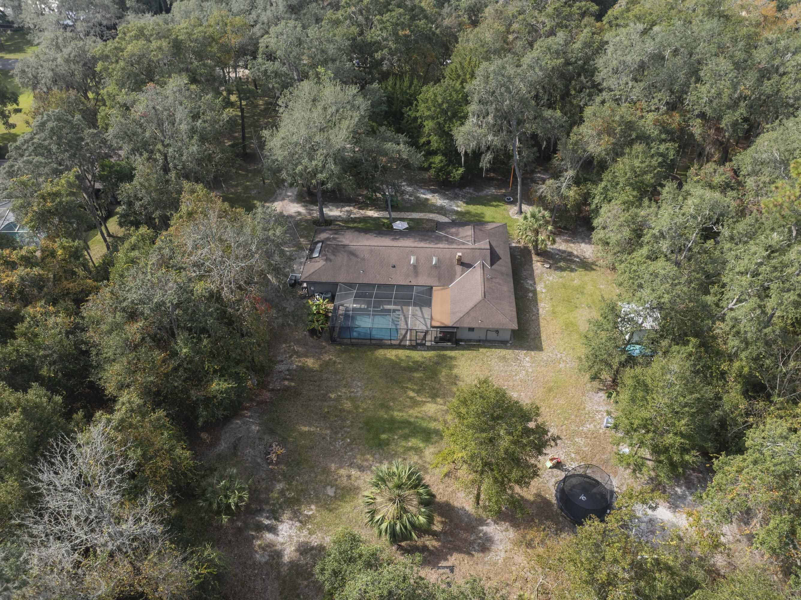 3572 Red Cloud Trail St. Augustine, FL 32086 - Photo 67 of 74 an aerial view of a house with yard swimming pool and outdoor seating