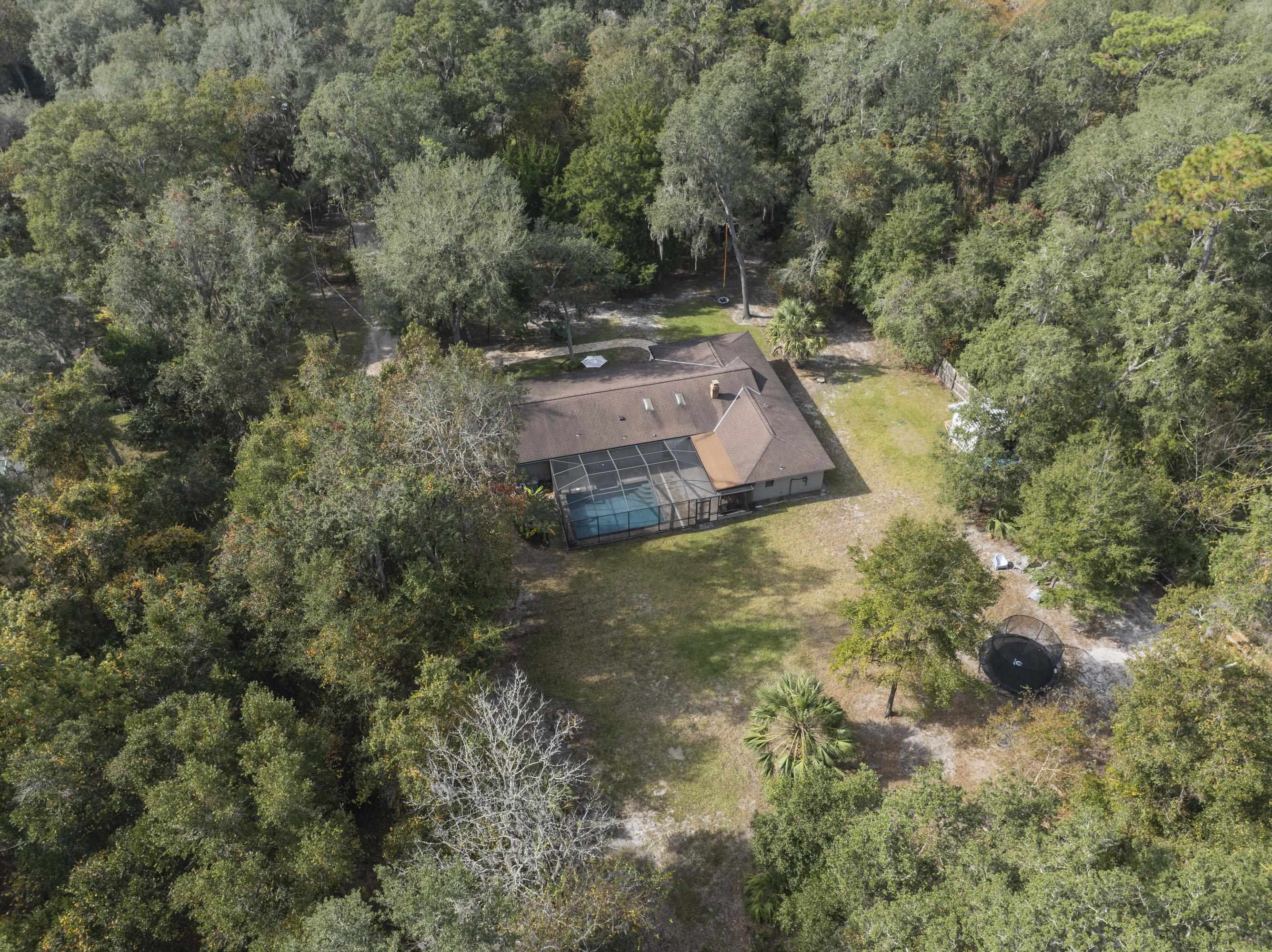 3572 Red Cloud Trail St. Augustine, FL 32086 - Photo 68 of 74 an aerial view of a house with yard and swimming pool