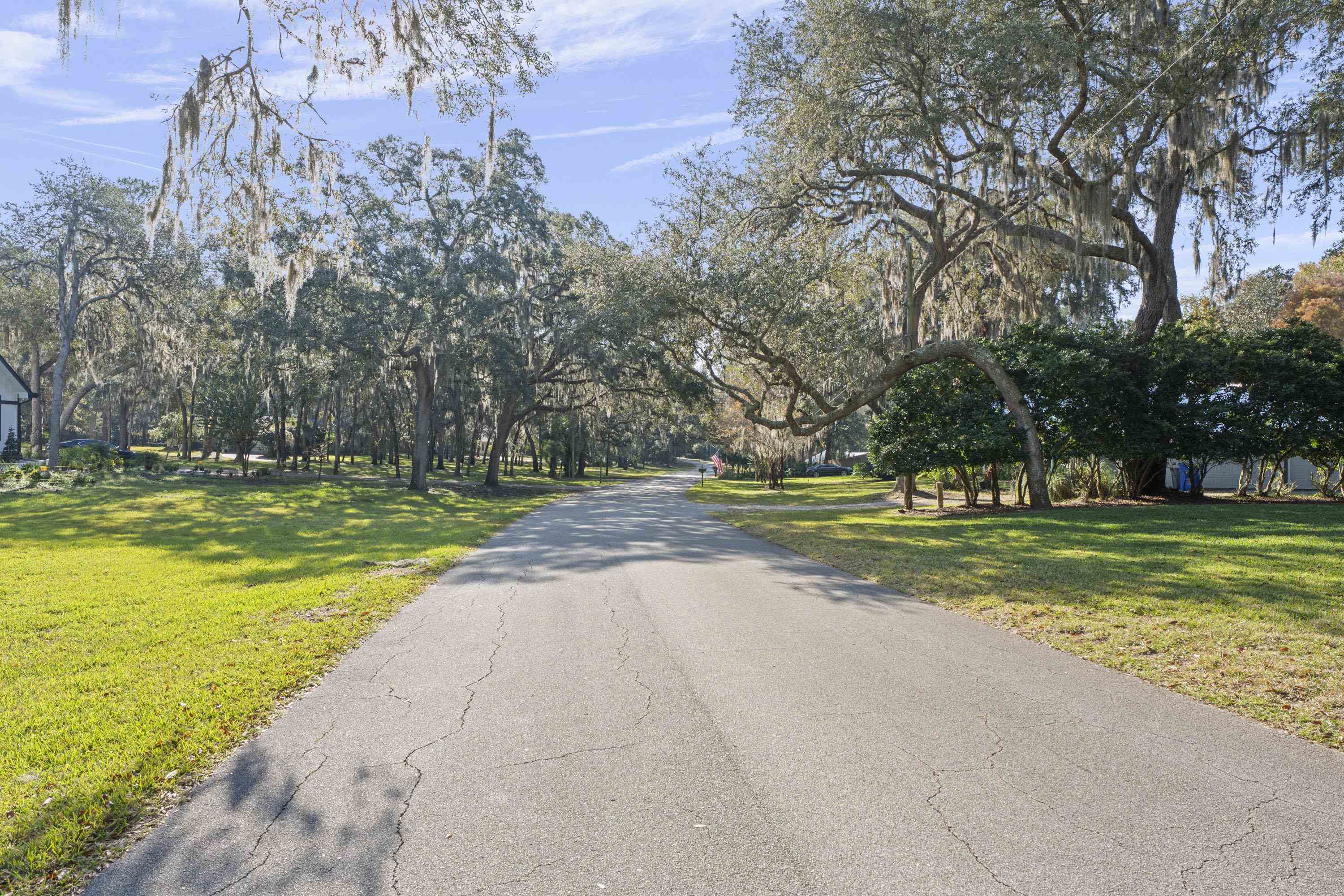 3572 Red Cloud Trail St. Augustine, FL 32086 - Photo 72 of 74 a view of a swimming pool and trees in the background