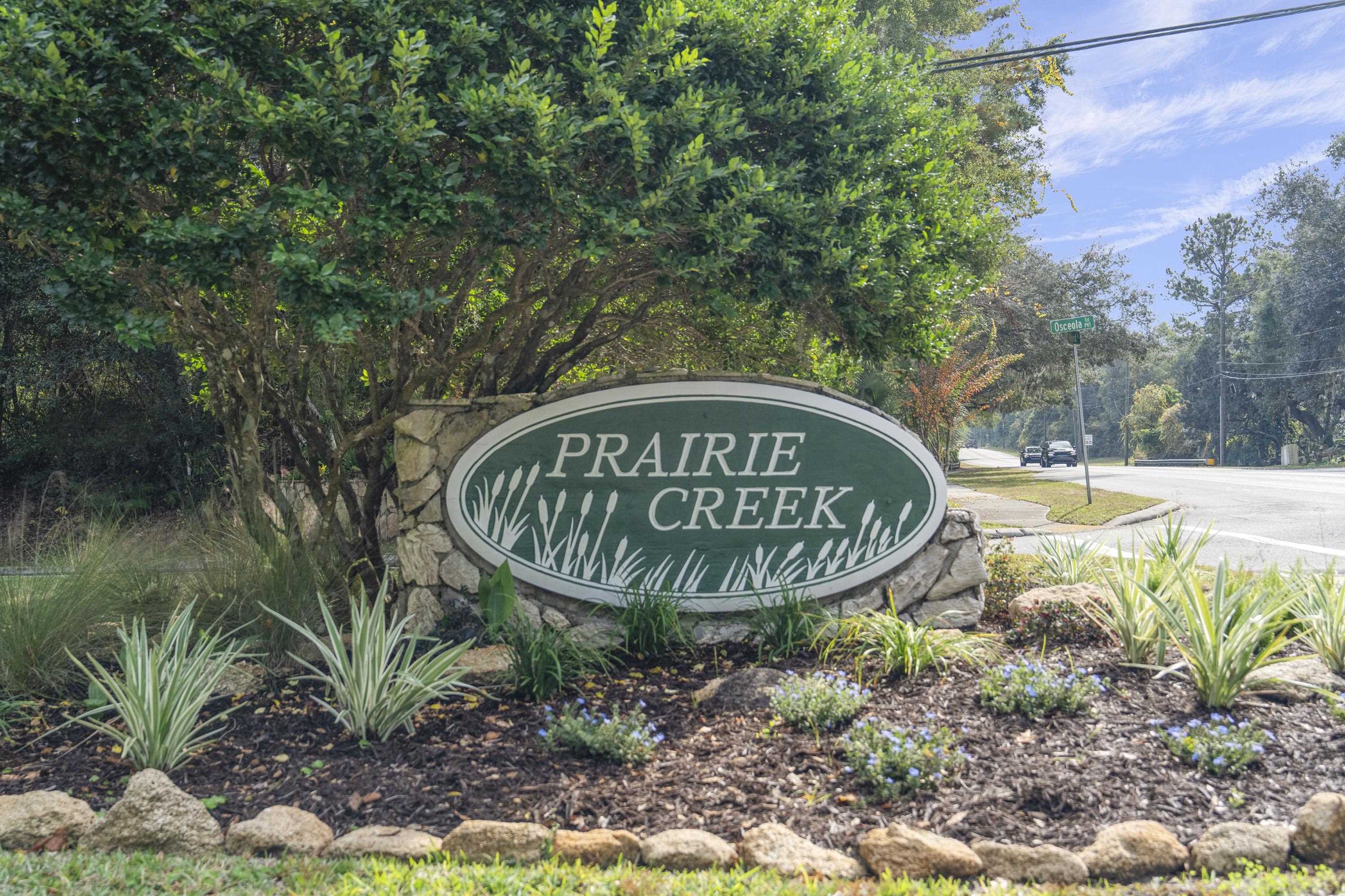 3572 Red Cloud Trail St. Augustine, FL 32086 - Photo 74 of 74 a view of a bench in a garden