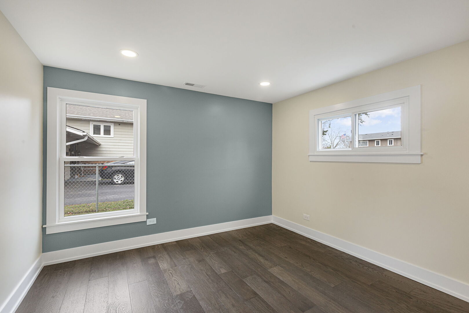 1910 Ashley Road Hoffman Estates, IL 60169 - Photo 15 of 30 a view of an empty room with a window and wooden floor