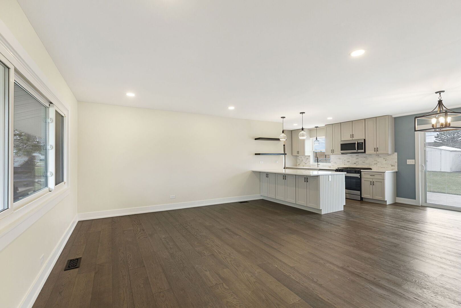 1910 Ashley Road Hoffman Estates, IL 60169 - Photo 2 of 30 a view of kitchen with wooden floor and electronic appliances