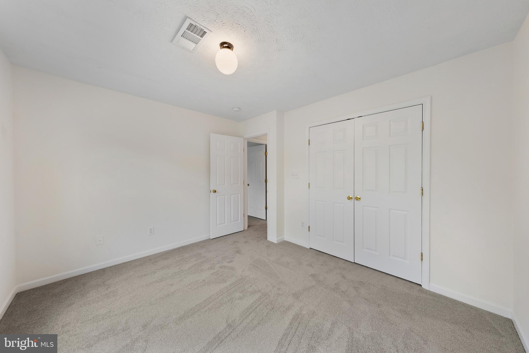 1612 Cattail Commons Way Denton, MD 21629 - Photo 31 of 67 a view of an empty room