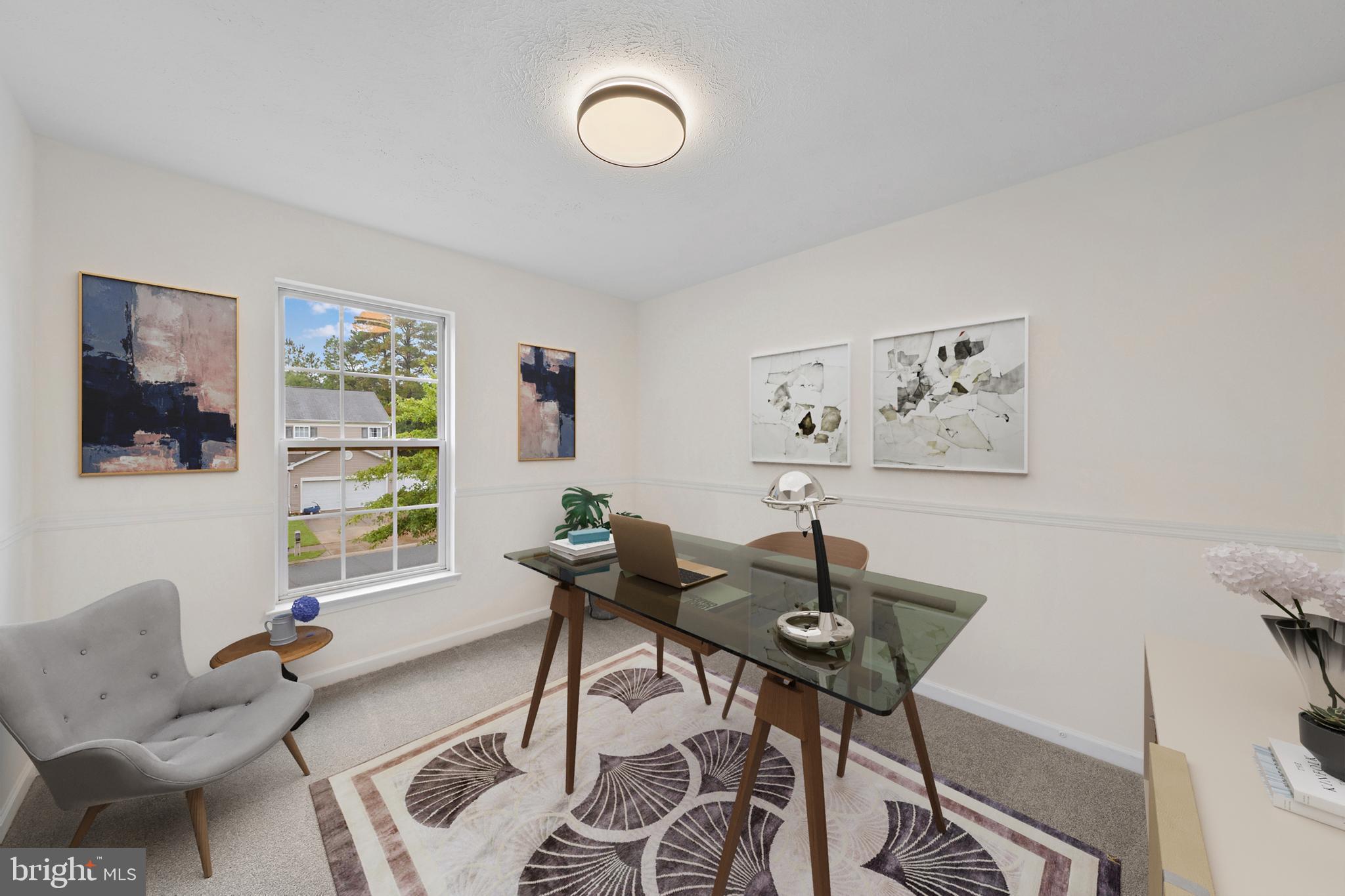 1612 Cattail Commons Way Denton, MD 21629 - Photo 33 of 67 a view of a livingroom with furniture and a window