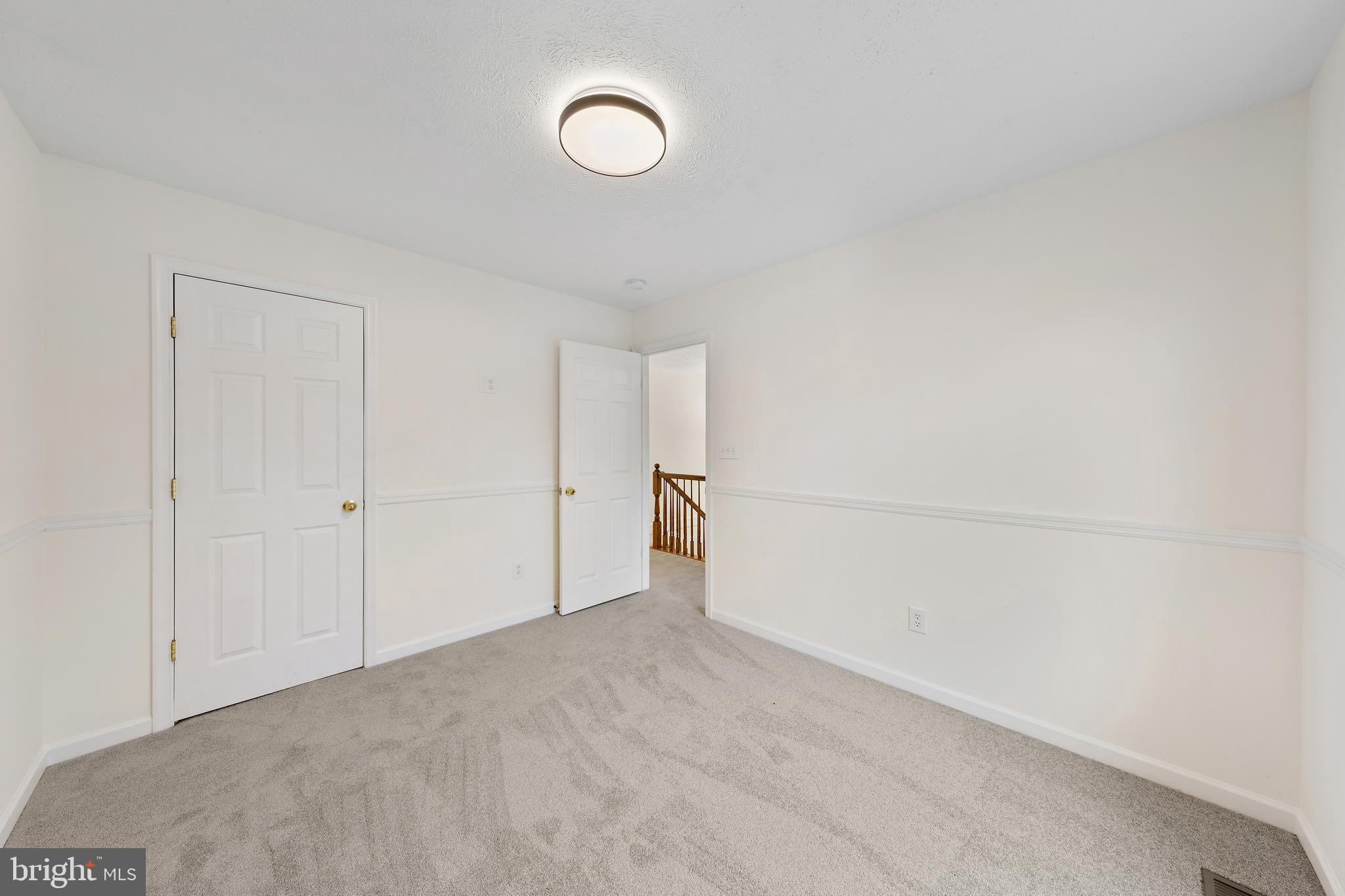 1612 Cattail Commons Way Denton, MD 21629 - Photo 36 of 67 a view of an empty room