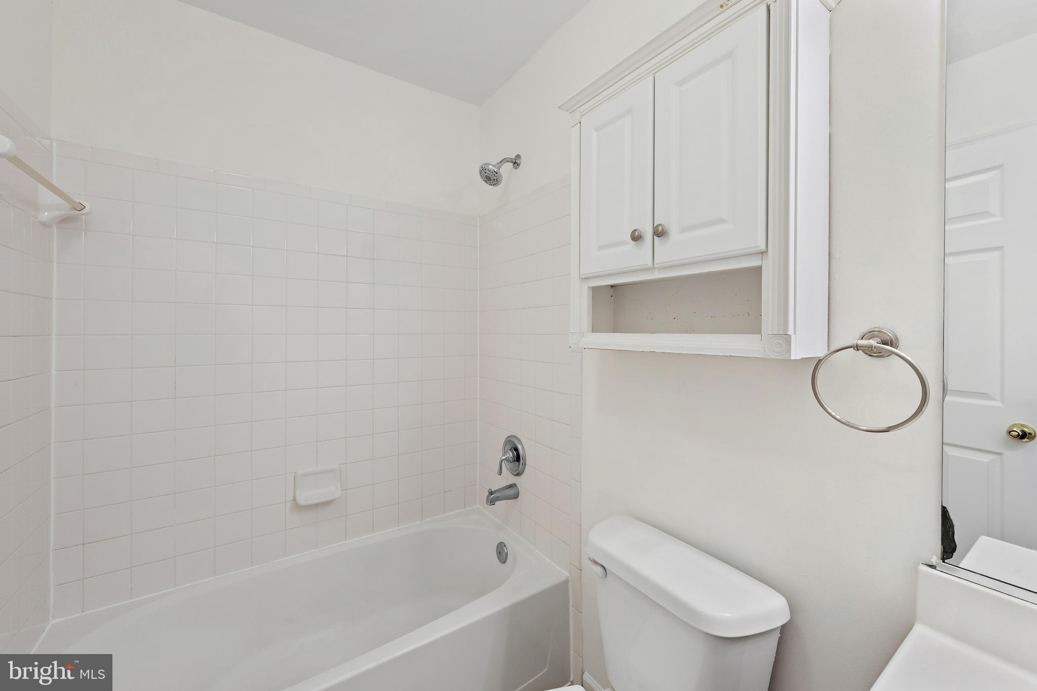 1612 Cattail Commons Way Denton, MD 21629 - Photo 39 of 67 a white toilet sitting next to a bath tub