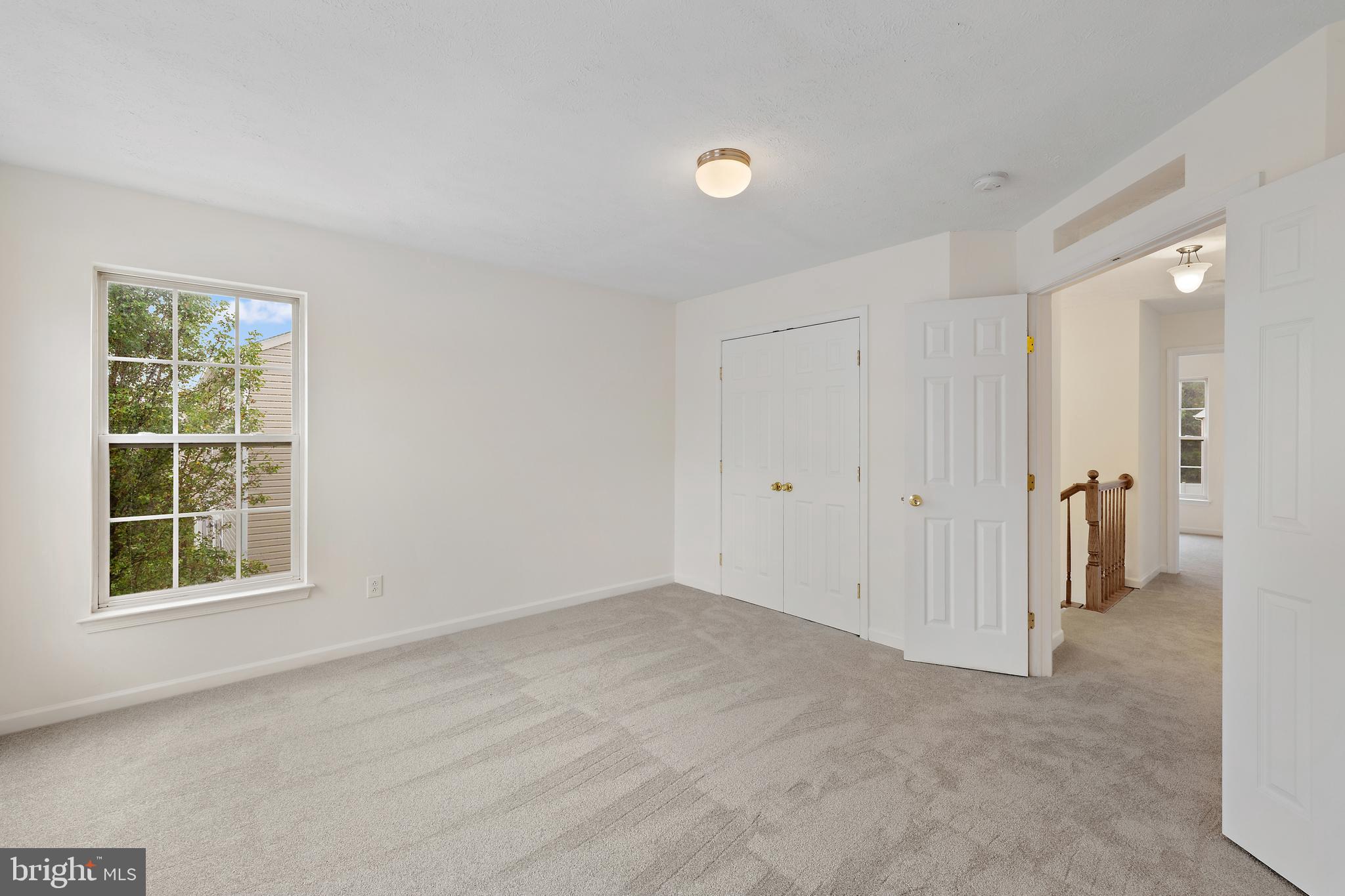 1612 Cattail Commons Way Denton, MD 21629 - Photo 44 of 67 an empty room with a window