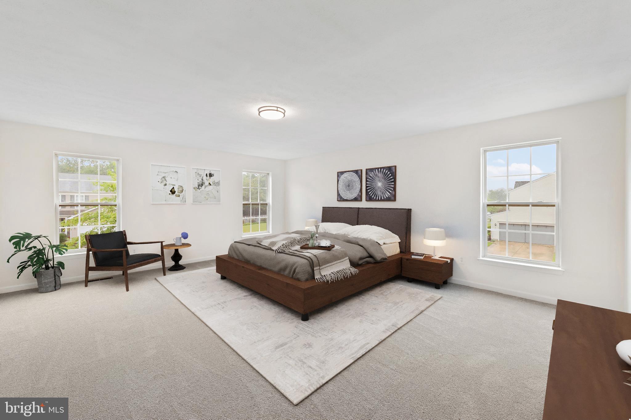 1612 Cattail Commons Way Denton, MD 21629 - Photo 49 of 67 a bedroom with a bed and a couch