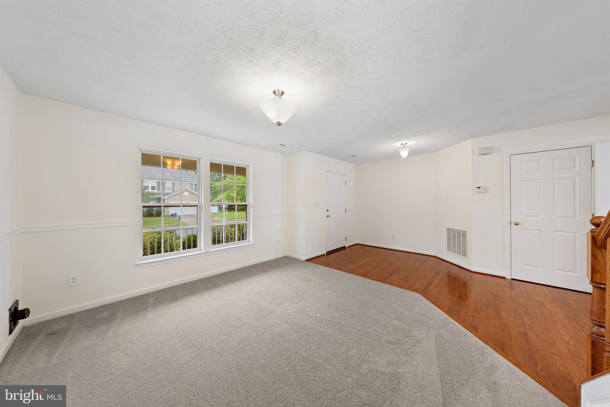 1612 Cattail Commons Way Denton, MD 21629 - Photo 8 of 67 a view of an empty room with a window