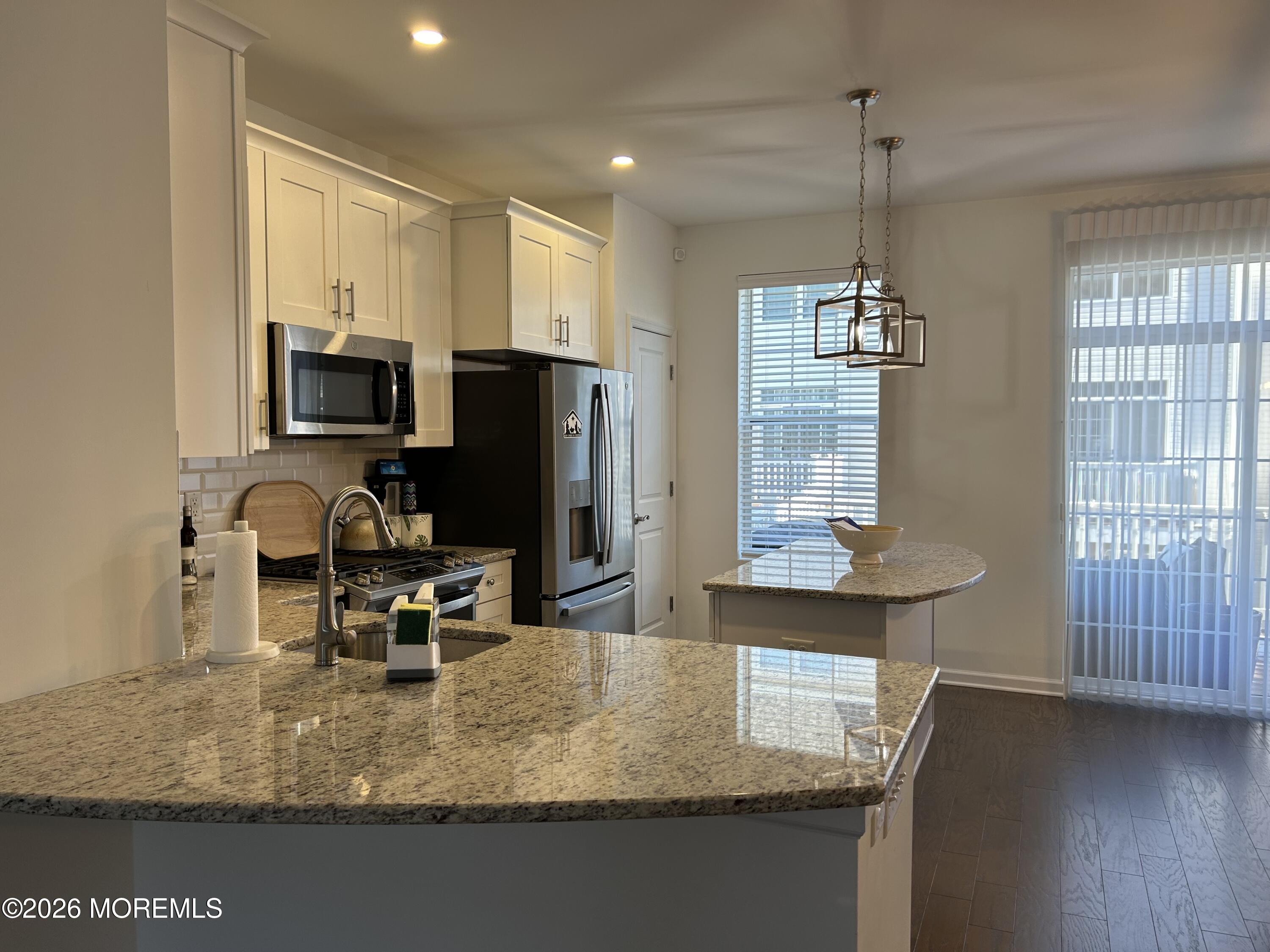 105 Revival Road, Unit 1305 Brick, NJ 08723 - Photo 17 of 36 KITCHEN W LARGE ISLAND