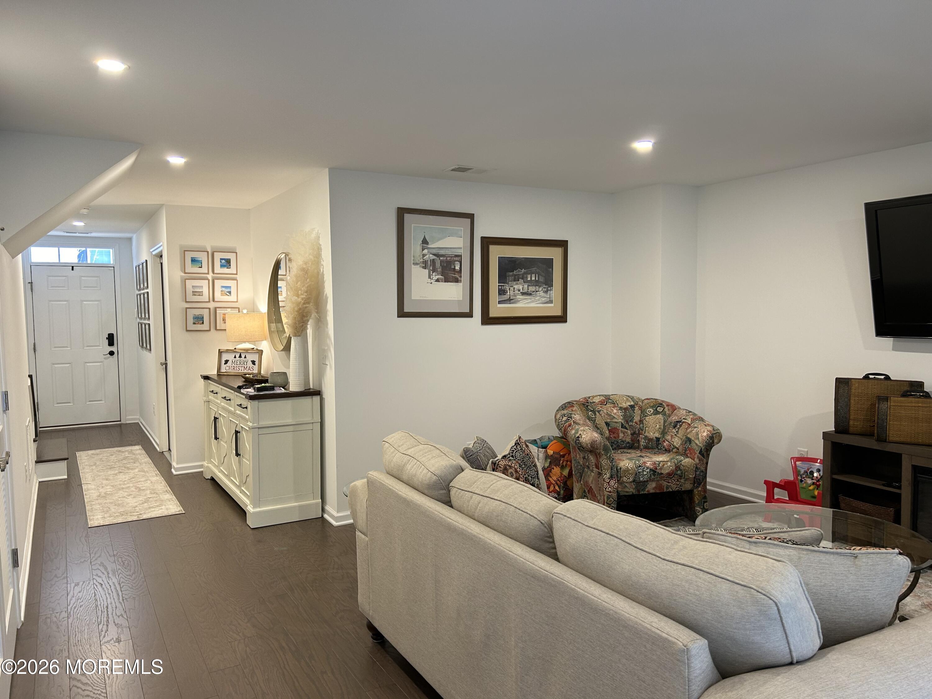 105 Revival Road, Unit 1305 Brick, NJ 08723 - Photo 3 of 36 DOWNSTAIRS LR TOWARD FRONT DOOR
