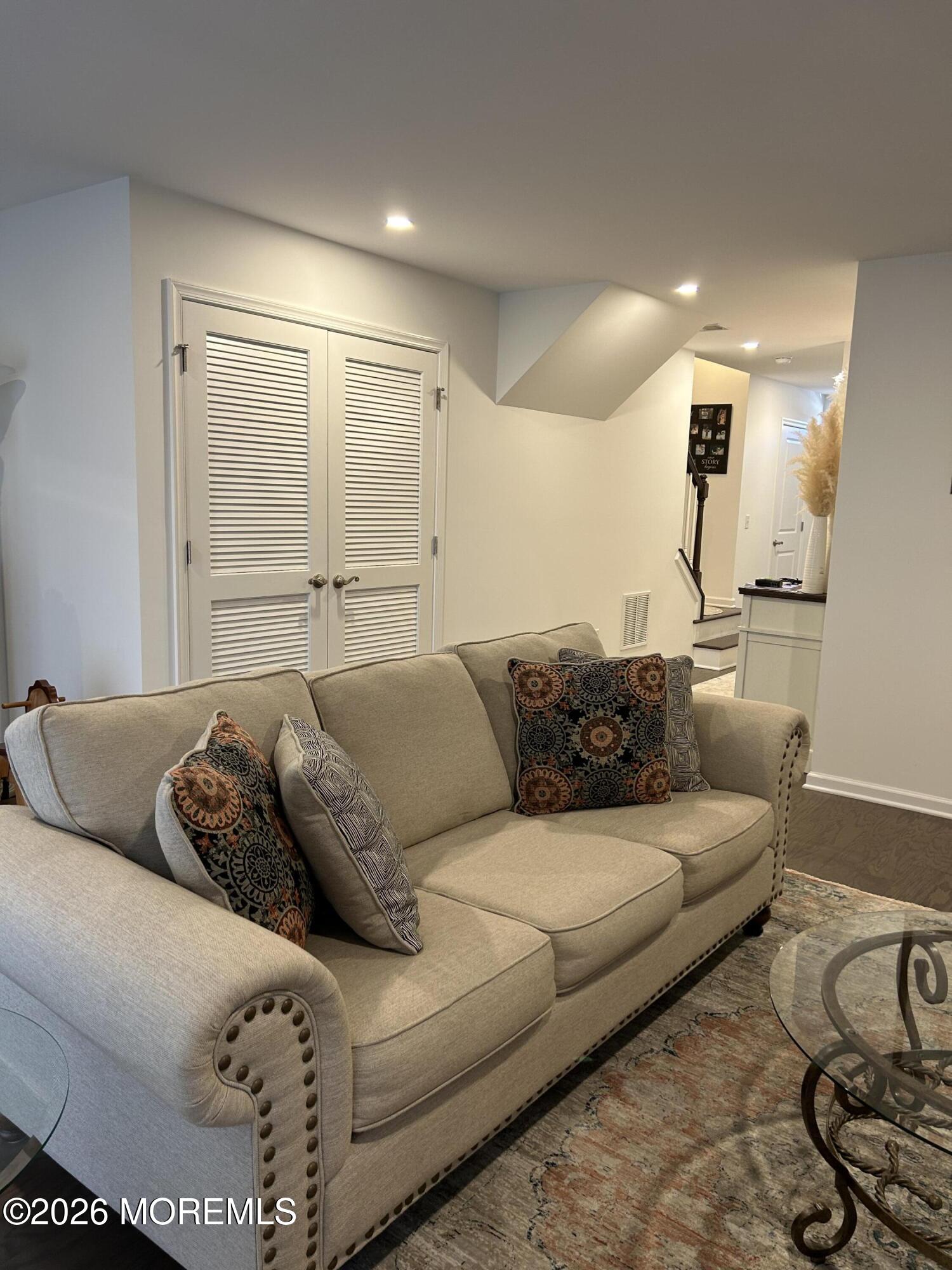105 Revival Road, Unit 1305 Brick, NJ 08723 - Photo 5 of 36 DOWNSTAIRS LR TOWARD FURNACE
