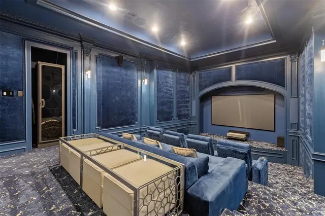 a room with pool table table soccer and windows