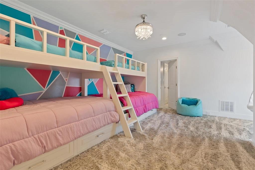 935 West Dove Road Southlake, TX 76092 - Photo 28 of 38 a bedroom with a bed and a lamp